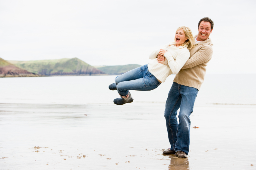 couple-playing-on-beach