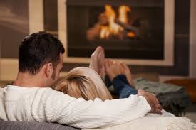 couple couch fireplace.jpg
